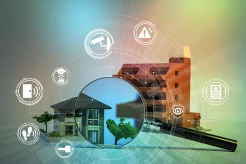 スペインの家やその他のアイコンの上にある虫眼鏡。